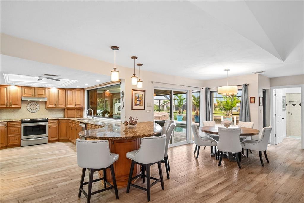 184 Colony Point Drive Punta Gorda, FL 33950 - Photo 8 of 58 a view of a dining room with furniture window and outside view
