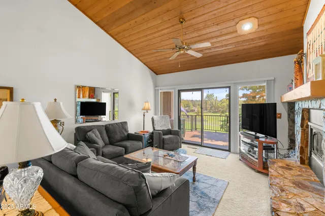 a kitchen with a refrigerator a sink and a window