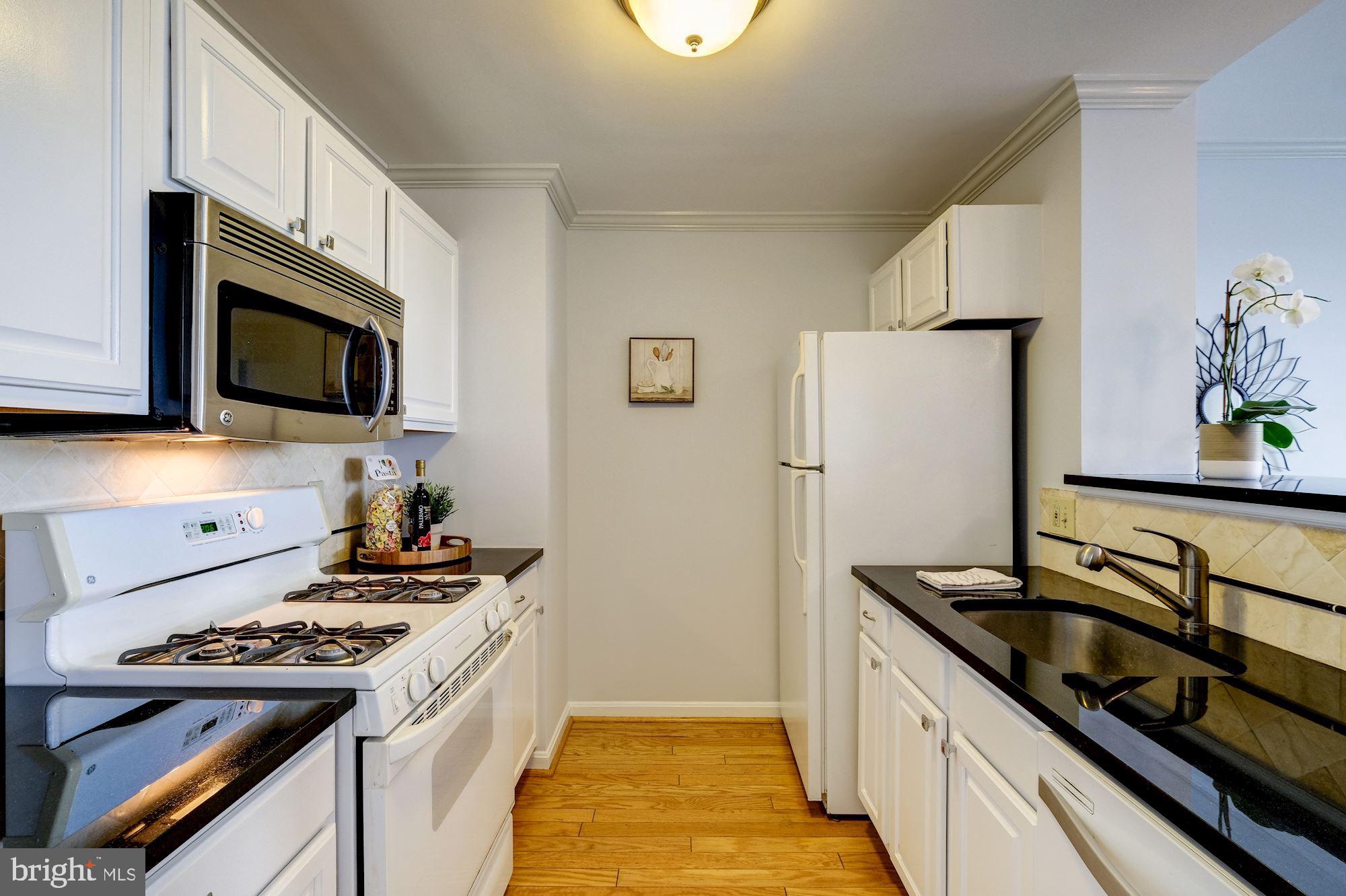 2004 11th Street Northwest, Unit 440 Washington, DC 20001 - Photo 3 of 18 Renovated kitchen with granite countertops