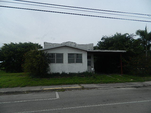1147 Bacom Point Road Pahokee, FL 33476 - Photo 1 of 15 FRONT
