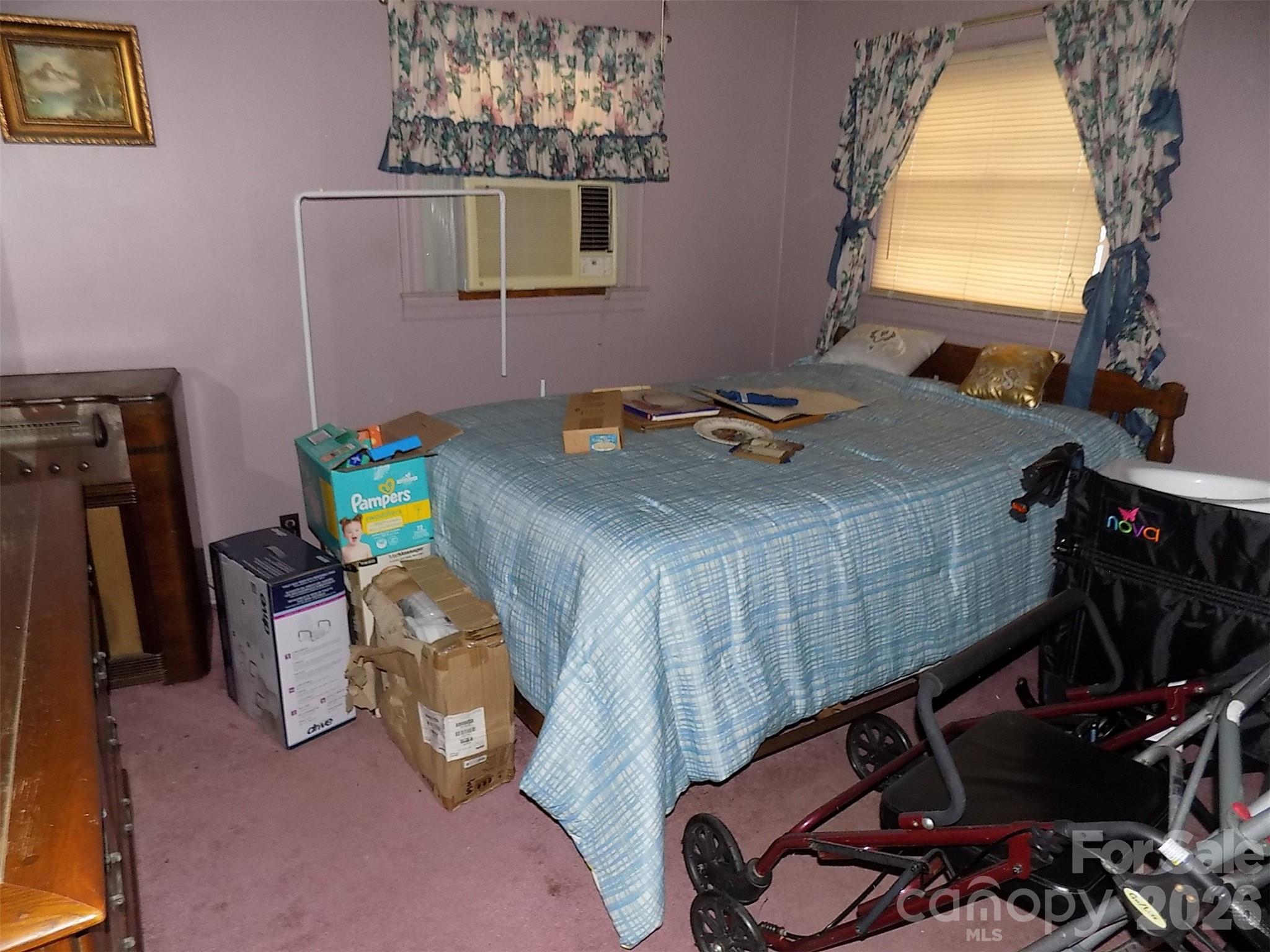2605 Lowell Road Gastonia, NC 28054 - Photo 12 of 21 a bedroom with bed and a window