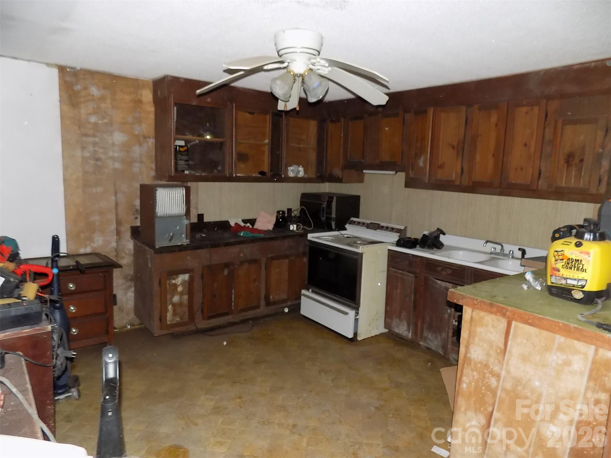 2605 Lowell Road Gastonia, NC 28054 - Photo 14 of 21 a kitchen with a cabinets and appliances
