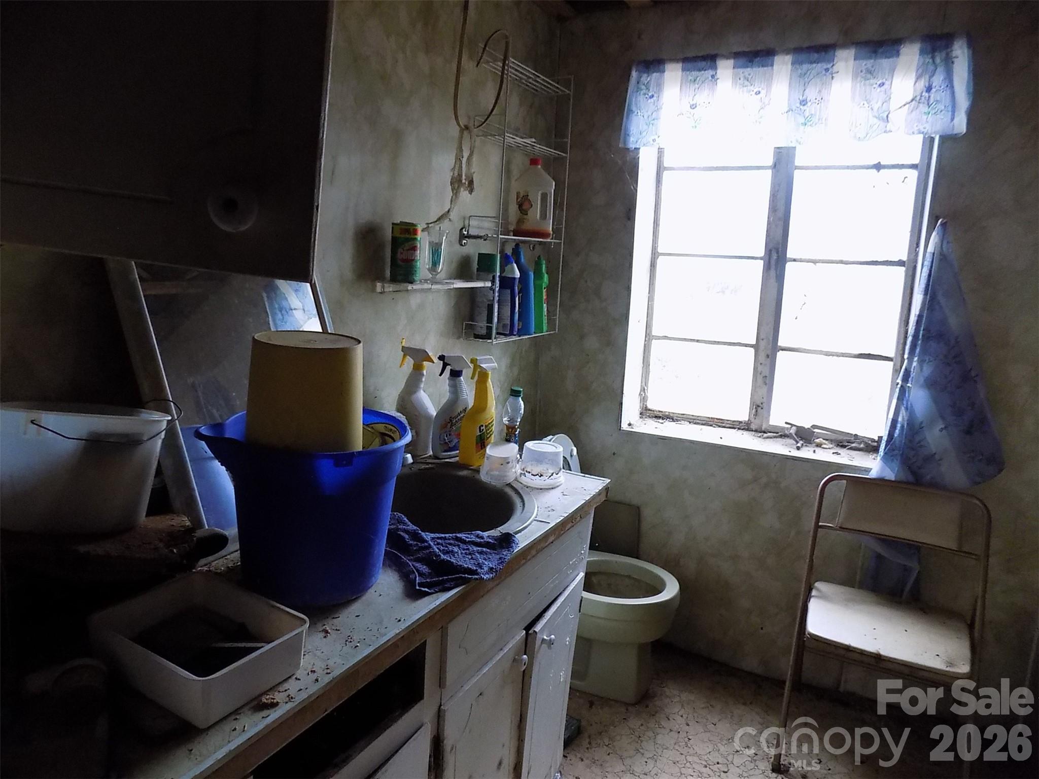 2605 Lowell Road Gastonia, NC 28054 - Photo 16 of 21 a living room with furniture and a window