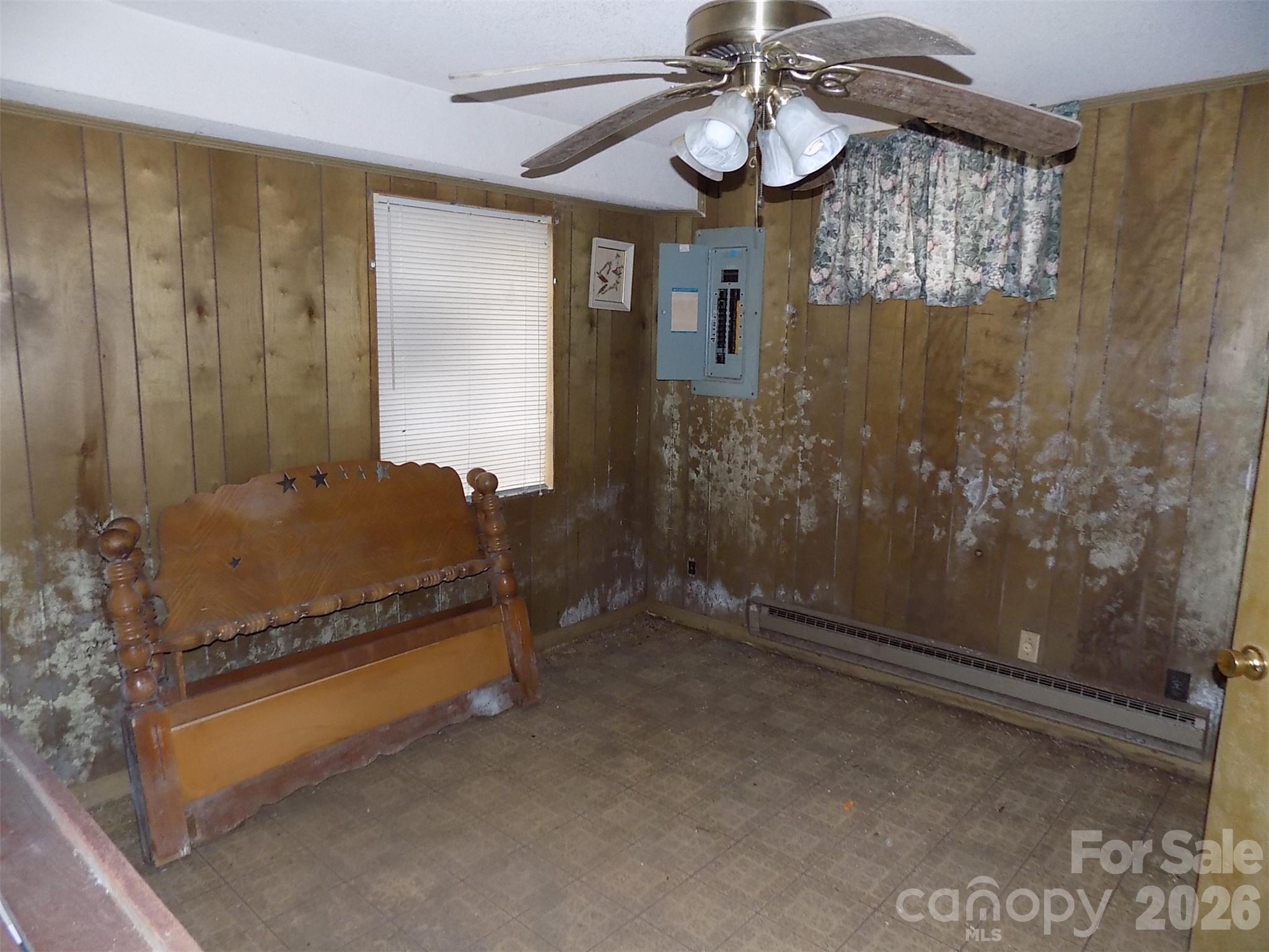 2605 Lowell Road Gastonia, NC 28054 - Photo 21 of 21 a view of room with a ceiling fan