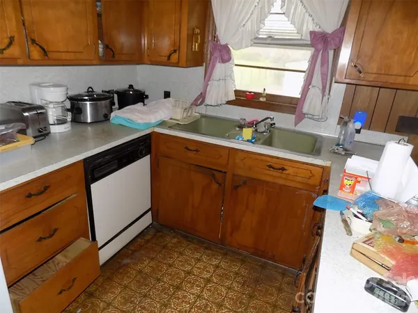 a view of a balcony with chairs