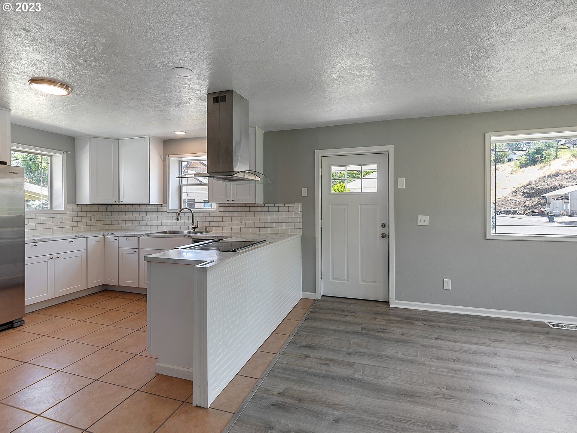 201 Southwest Hailey Avenue Pendleton, OR 97801 - Photo 5 of 35 a kitchen with a sink cabinets and window