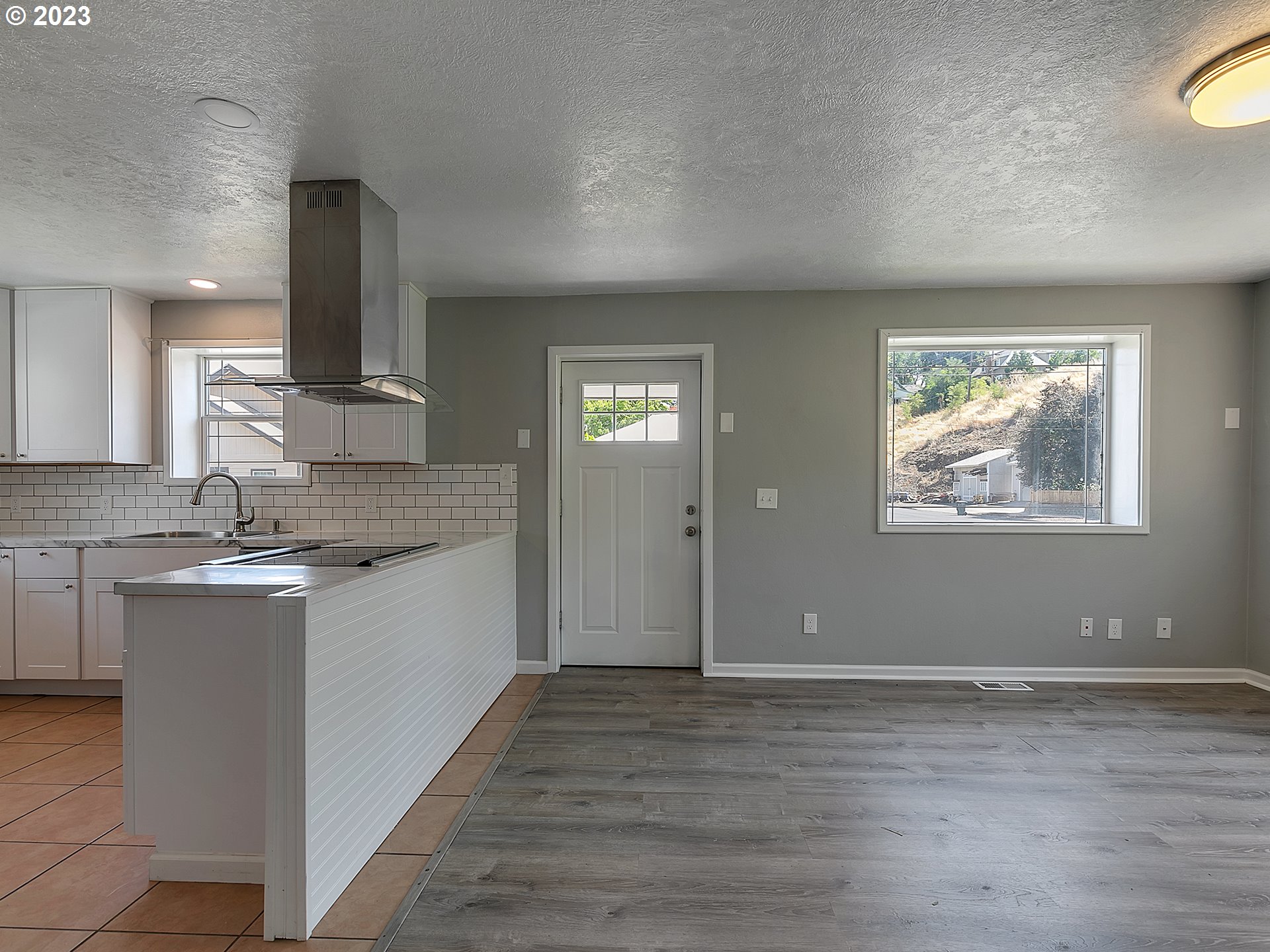 201 Southwest Hailey Avenue Pendleton, OR 97801 - Photo 10 of 35 a view of kitchen with sink microwave and cabinets