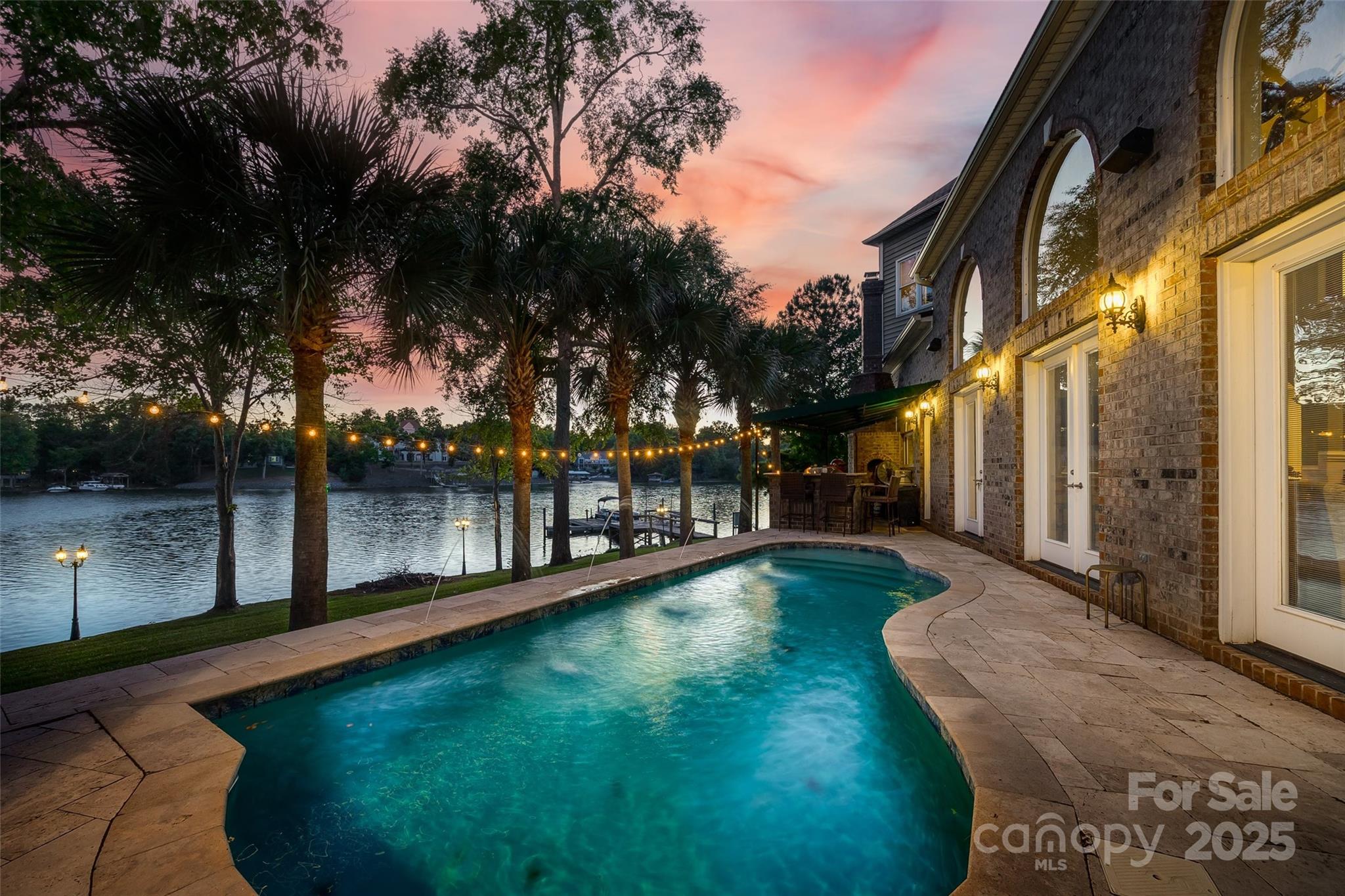 5650 Riverfront Road Clover, SC 29710 - Photo 2 of 48 a view of a lake with a garden