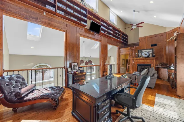 a view of balcony with wooden floor and fence