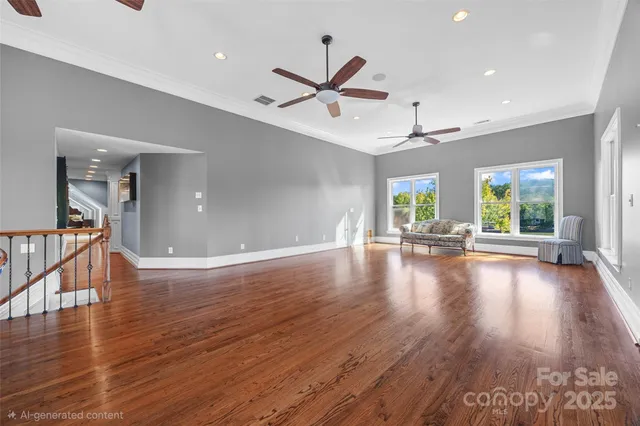 a kitchen with stainless steel appliances kitchen island granite countertop a refrigerator and stove