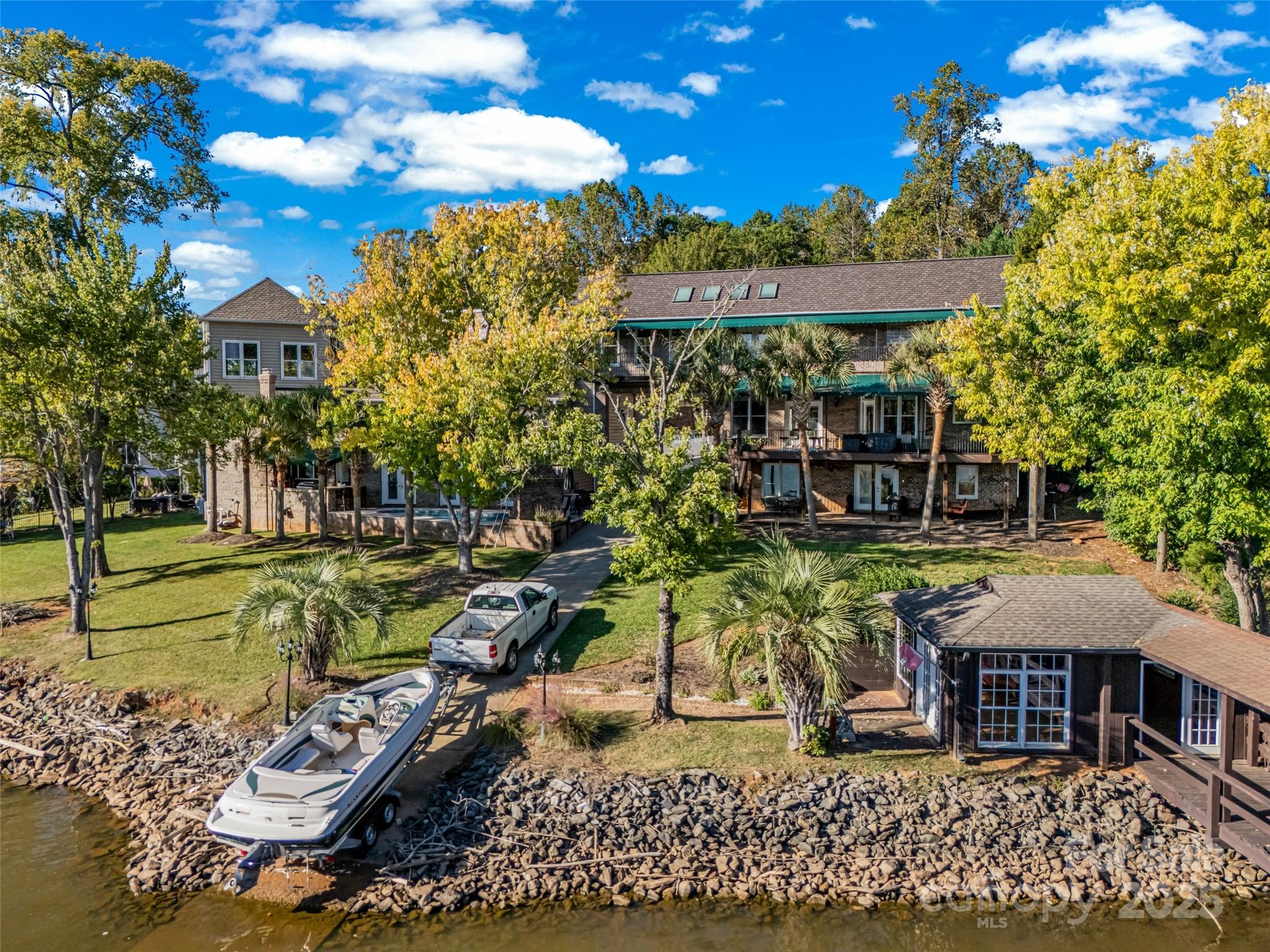 5650 Riverfront Road Clover, SC 29710 - Photo 40 of 48 a view of a chairs and table in the patio