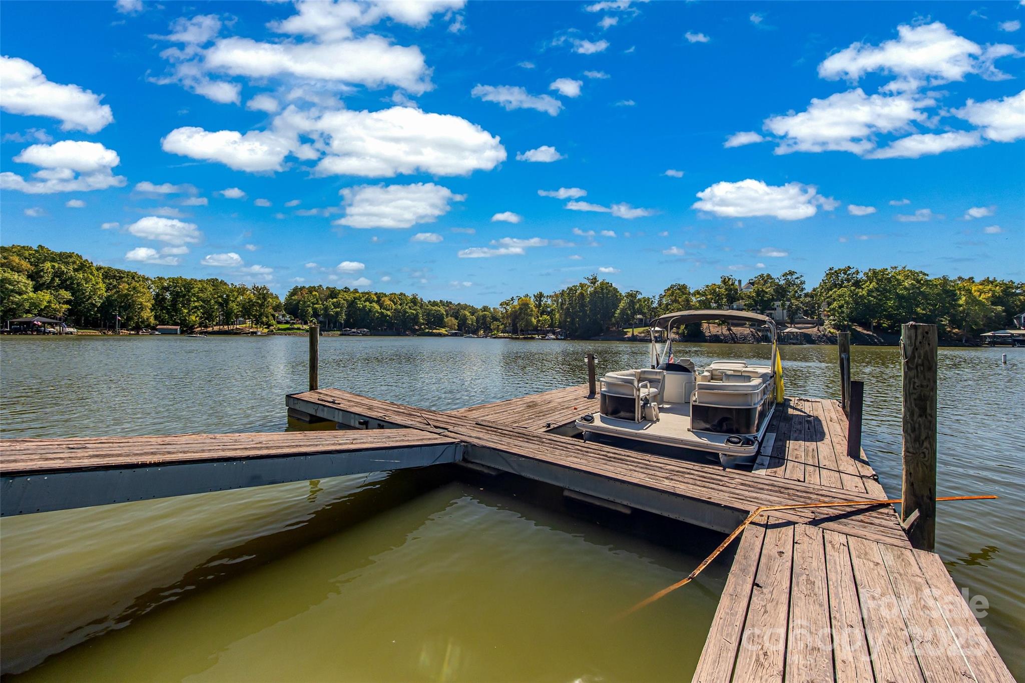 5650 Riverfront Road Clover, SC 29710 - Photo 44 of 48 a view of a lake with two chairs