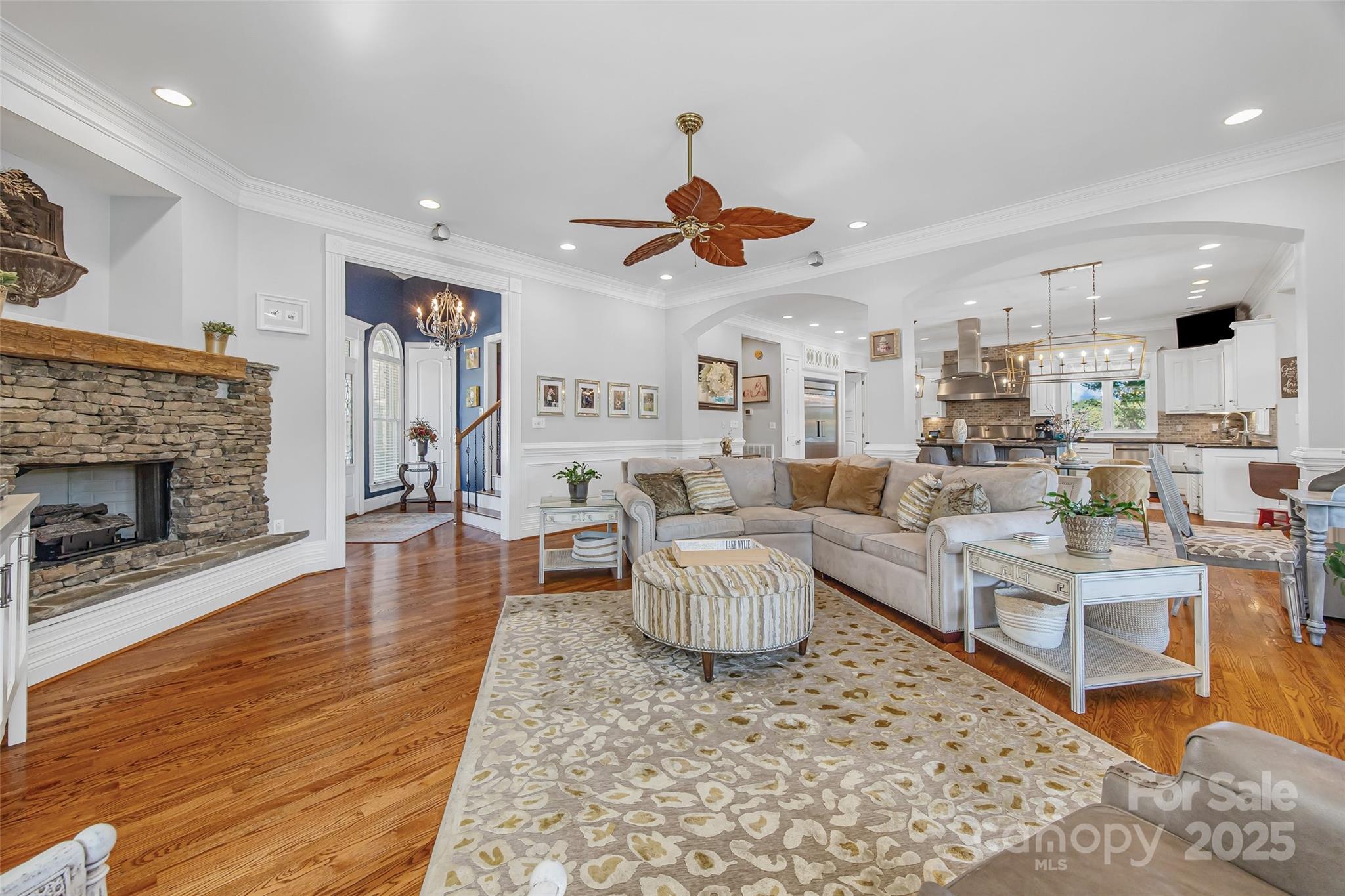 5650 Riverfront Road Clover, SC 29710 - Photo 5 of 48 a living room with furniture a rug and a fireplace
