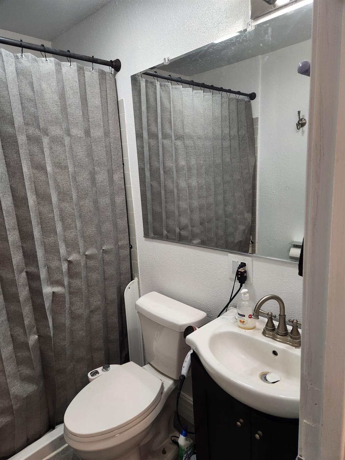 994 Fleda Avenue Olivehurst, CA 95961 - Photo 13 of 20 a bathroom with a sink toilet and shower