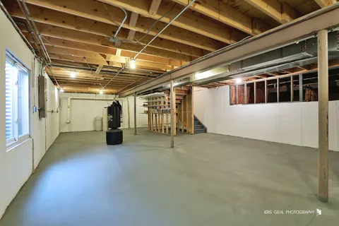 a view of an empty room with glass door