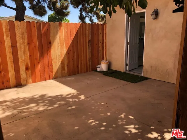 a view of a backyard of a house