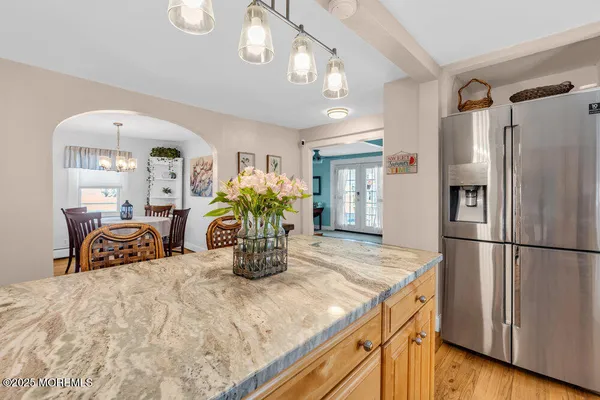 a kitchen with counter top space and refrigerator