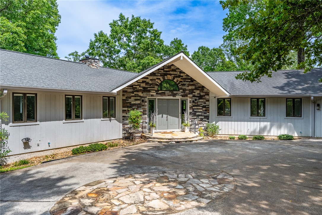 118 Beacon Ridge Circle Salem, SC 29676 - Photo 1 of 45 A stone-clad entryway with a gabled roofline welcomes all to this inviting home.