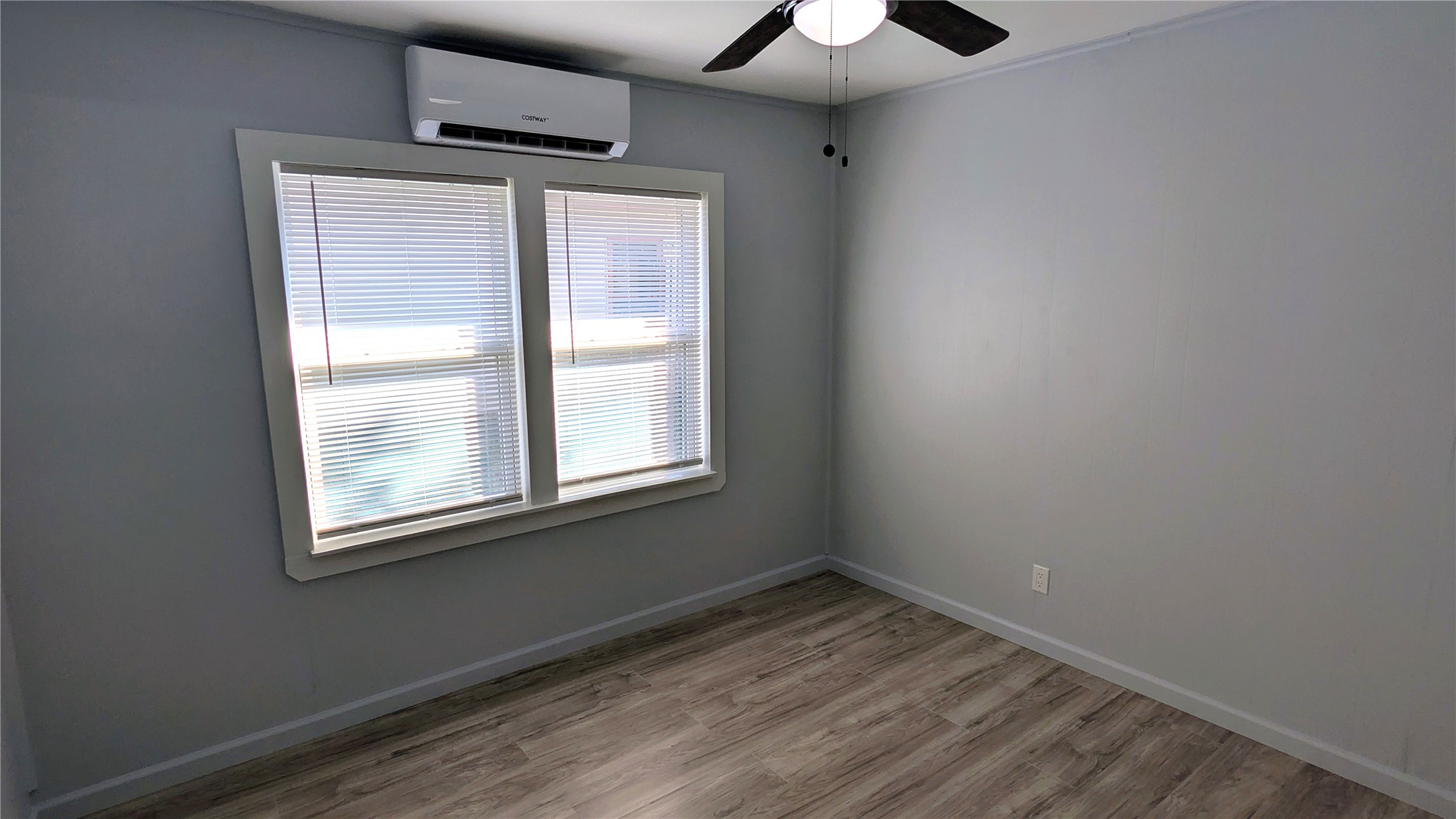 4122 Botany Lane Houston, TX 77047 - Photo 11 of 24 an empty room with a window