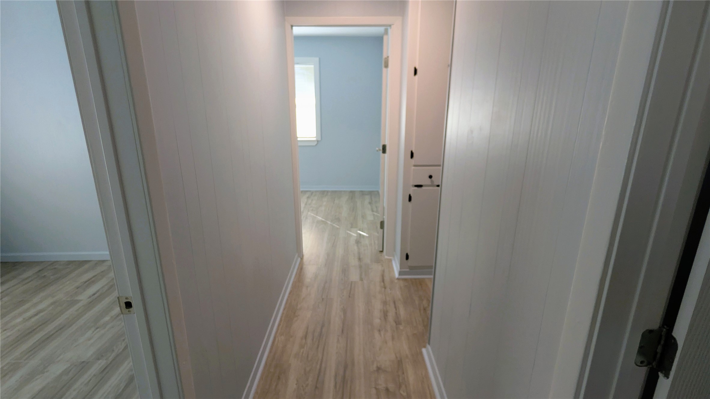 4122 Botany Lane Houston, TX 77047 - Photo 17 of 24 a view of a bathroom from a corridor