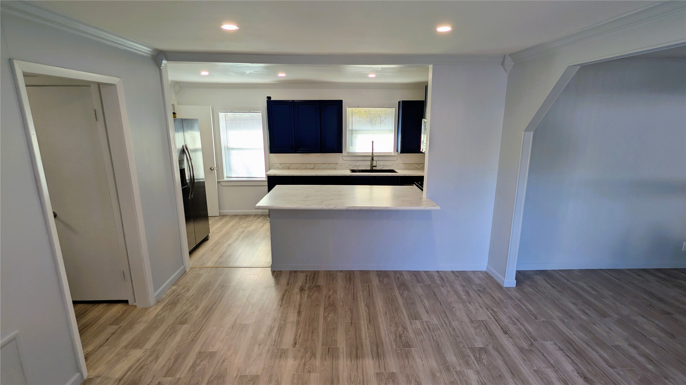 4122 Botany Lane Houston, TX 77047 - Photo 5 of 24 a view of kitchen with wooden floor