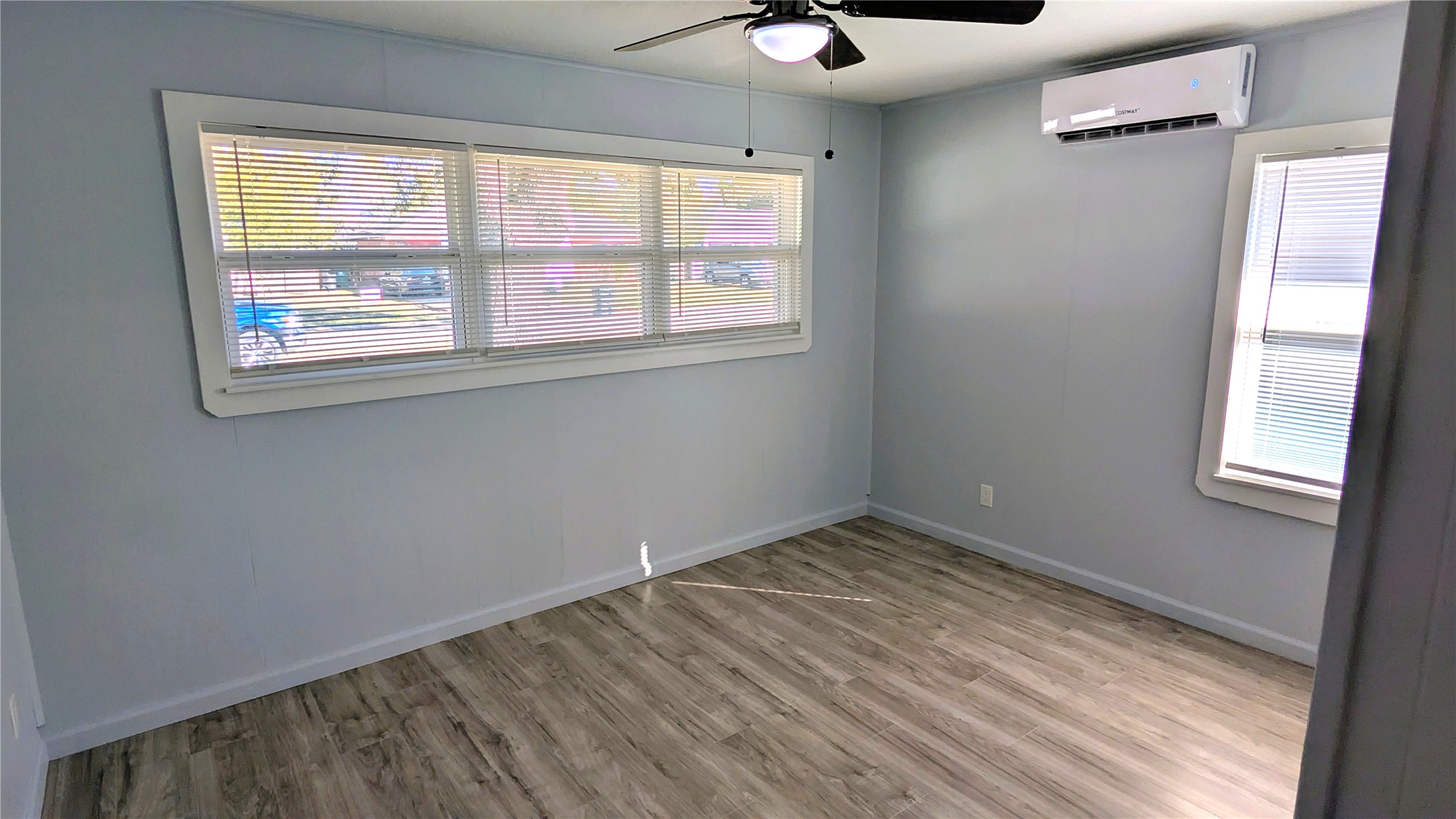 4122 Botany Lane Houston, TX 77047 - Photo 9 of 24 a view of an empty room with a window