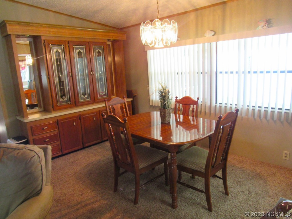 4347 Cedar Way Edgewater, FL 32141 - Photo 14 of 32 a dining room with furniture and window