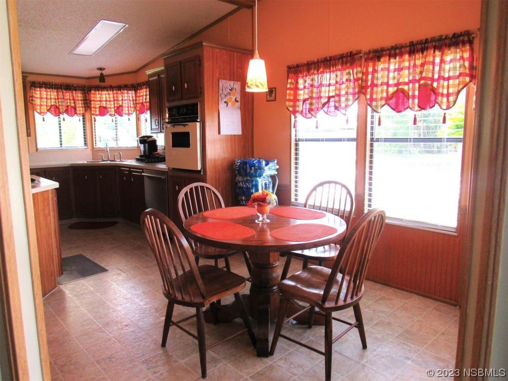 4347 Cedar Way Edgewater, FL 32141 - Photo 6 of 32 a dining room with furniture and window