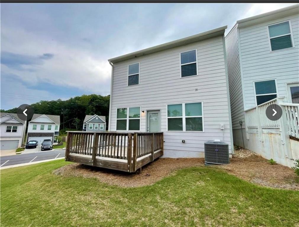 219 Turner Lane Woodstock, GA 30188 - Photo 15 of 15 a view of backyard with deck and deck