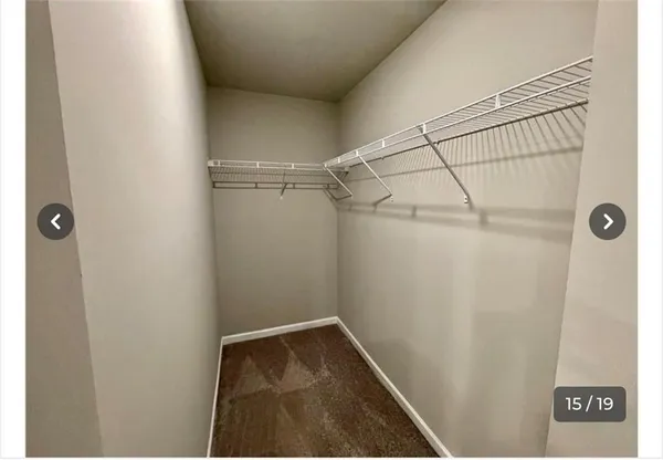 a view of a room with racks on the wall