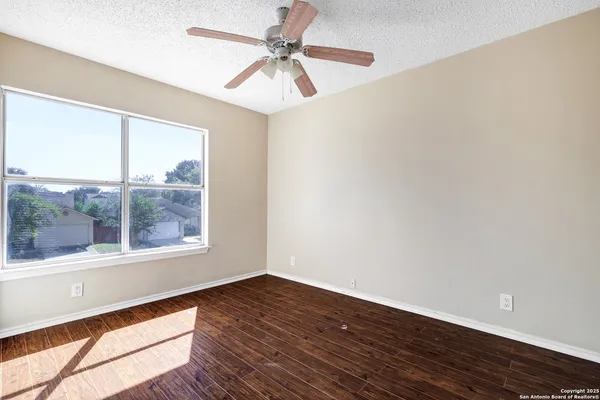 a view of a couches in backyard of house