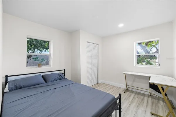 a room with a bed and a table