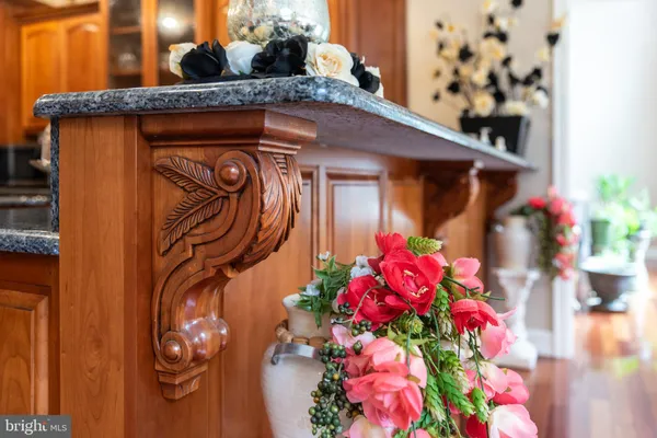 a bath tub sitting in a bathroom next to a window