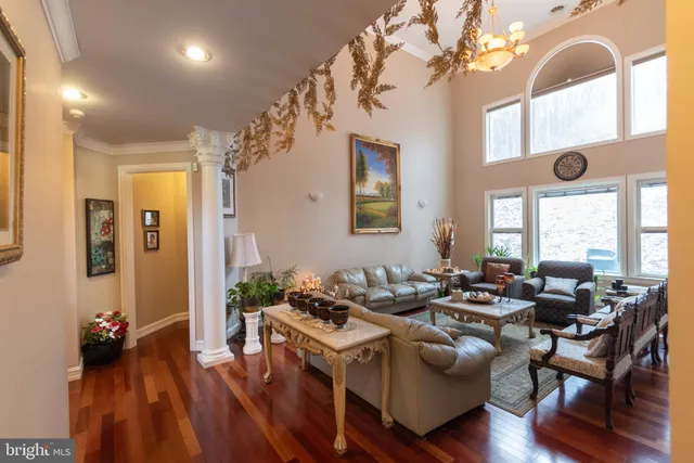 a bed room with furniture and a flat screen tv