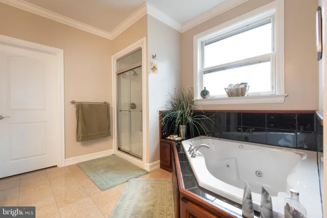 a bed room with a bed and dresser