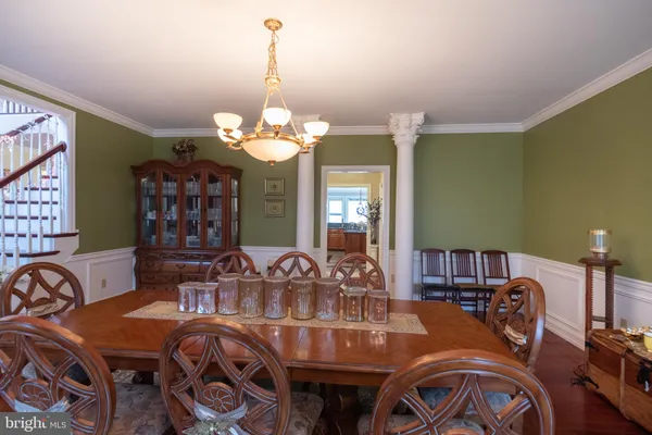 a kitchen with stainless steel appliances granite countertop a stove a sink dishwasher and a refrigerator