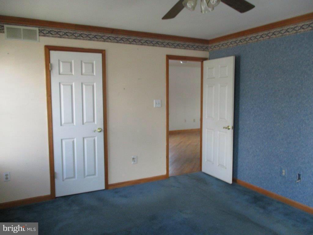 3223 Lynch Road Baltimore, MD 21219 - Photo 12 of 15 an empty room with windows