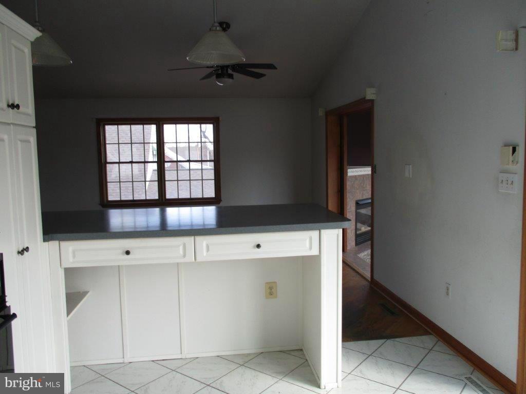3223 Lynch Road Baltimore, MD 21219 - Photo 7 of 15 a view of cabinets