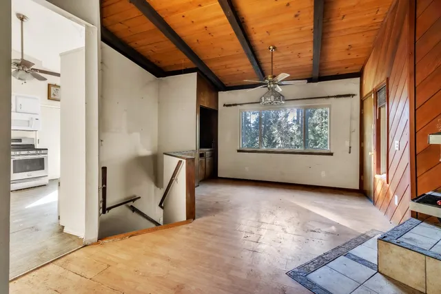 a view of a hallway with a chandelier