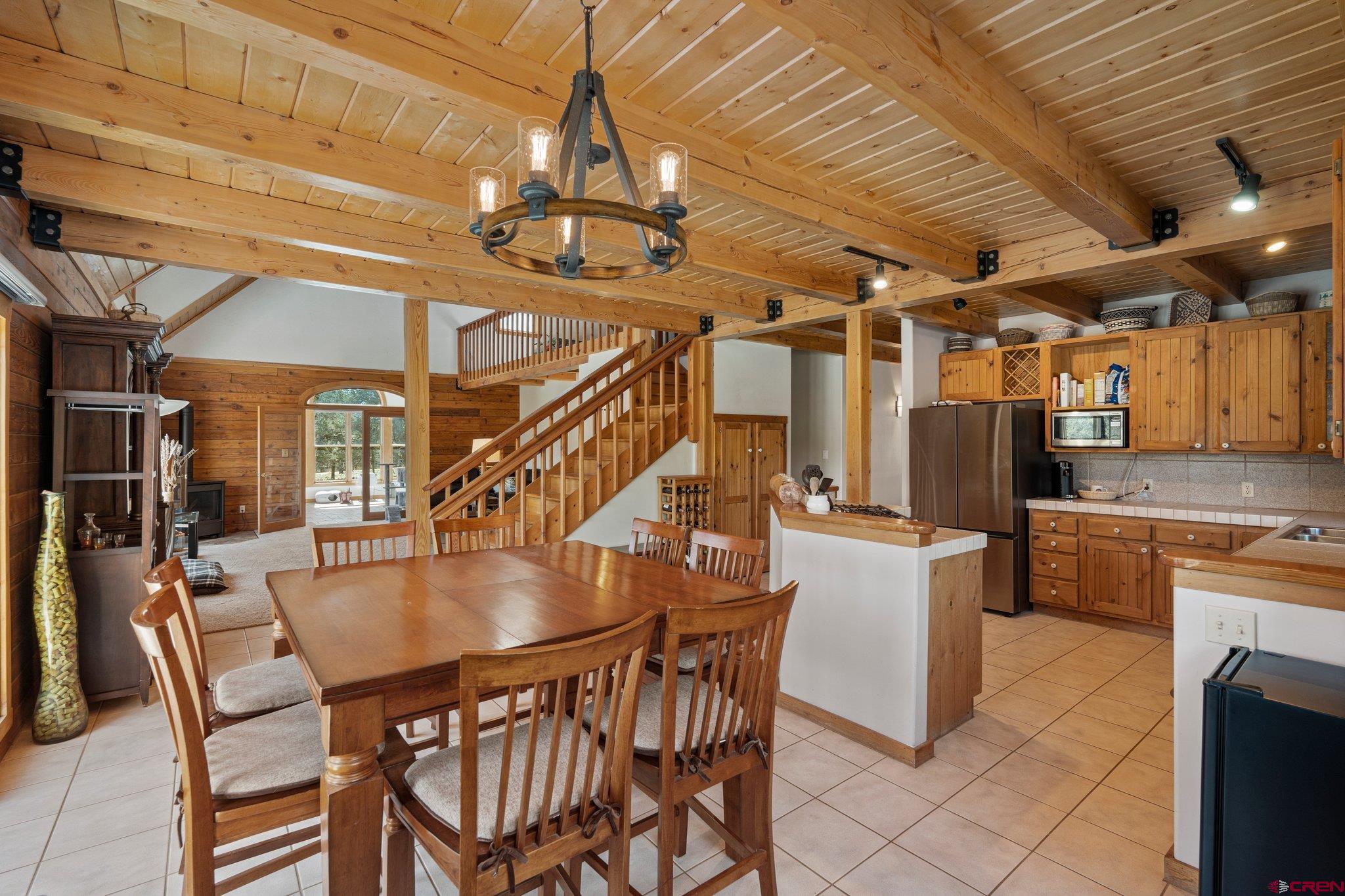 32 Meadows Road Durango, CO 81301 - Photo 10 of 35 a dining room with furniture and window
