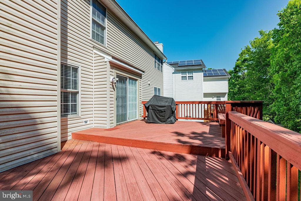 9629 Utica Place Springdale, MD 20721 - Photo 3 of 50 Large deck off kitchen, great for entertaining
