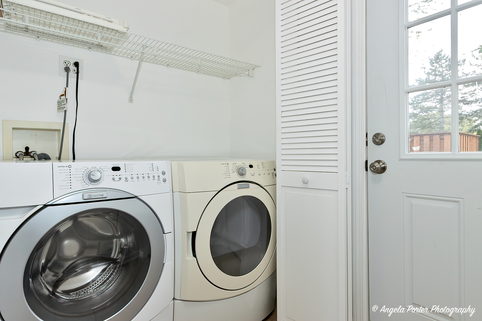 7 Manor Road Lake Zurich, IL 60047 - Photo 16 of 27 a view of a hallway with washer and dryer
