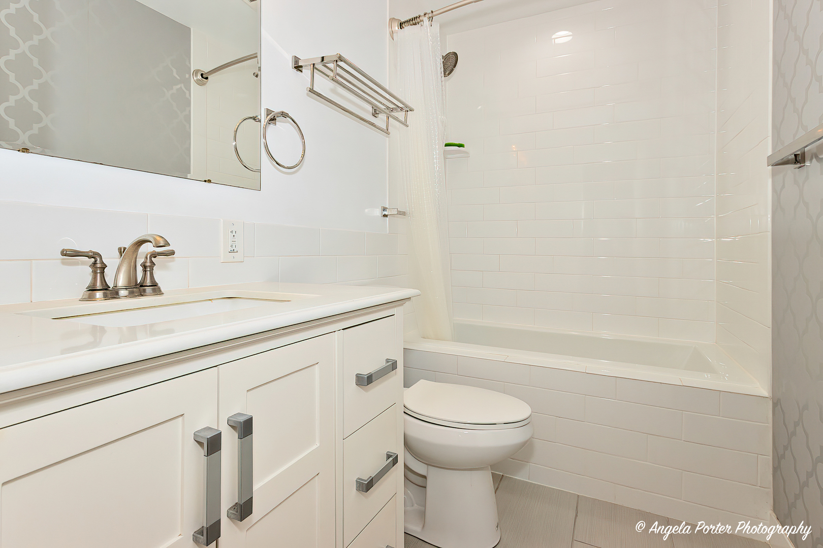 7 Manor Road Lake Zurich, IL 60047 - Photo 19 of 27 a bathroom with a sink a toilet and shower