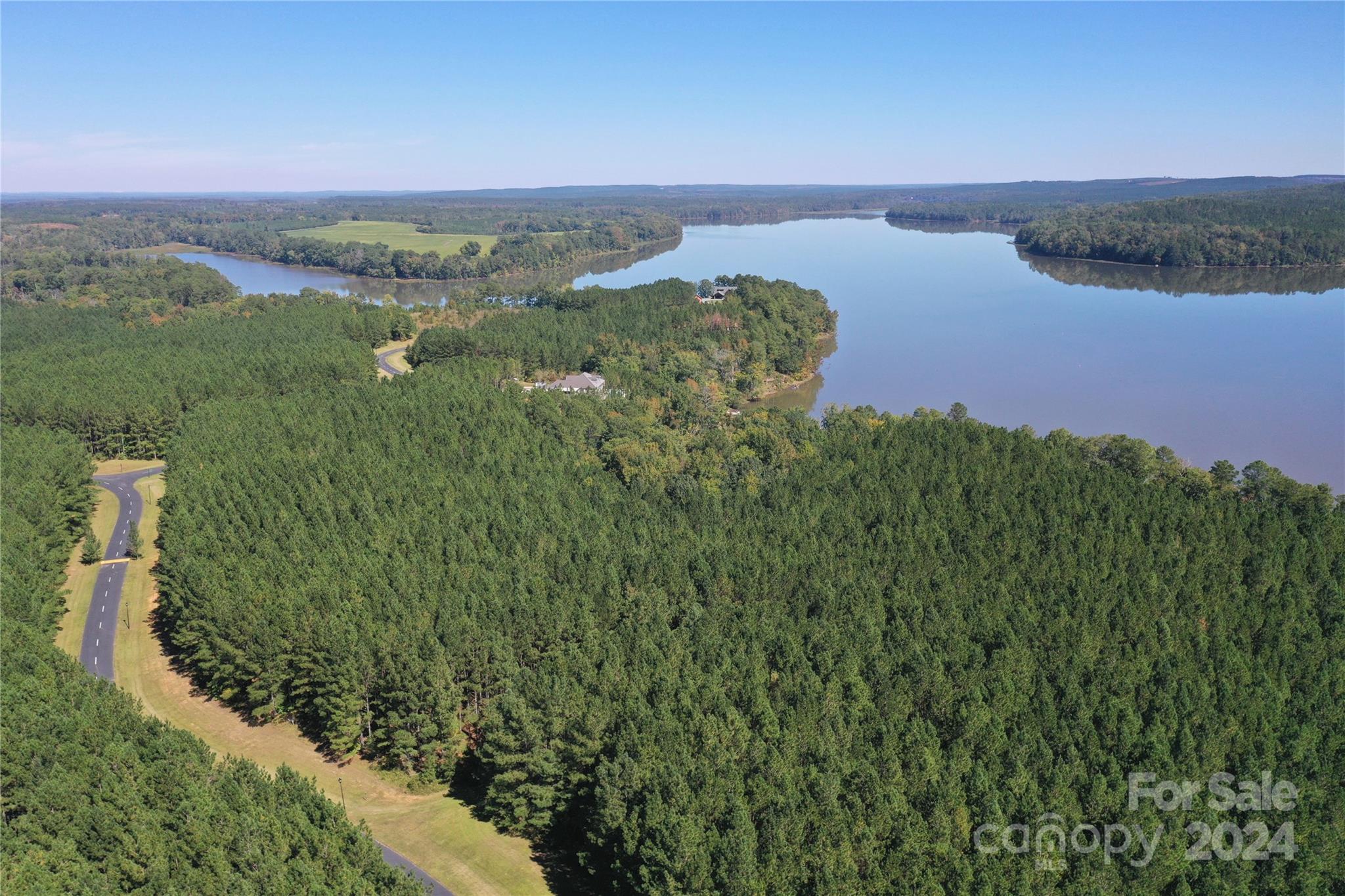 Tbd Tbd Spencer Pointe Road, Unit LOT 20C Lilesville, NC 28091 - Photo 21 of 22 an aerial view of a houses with a yard