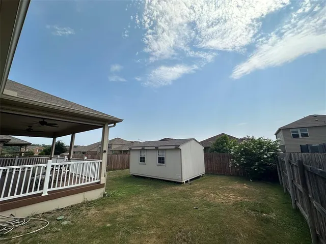 a view of a porch in front of a house