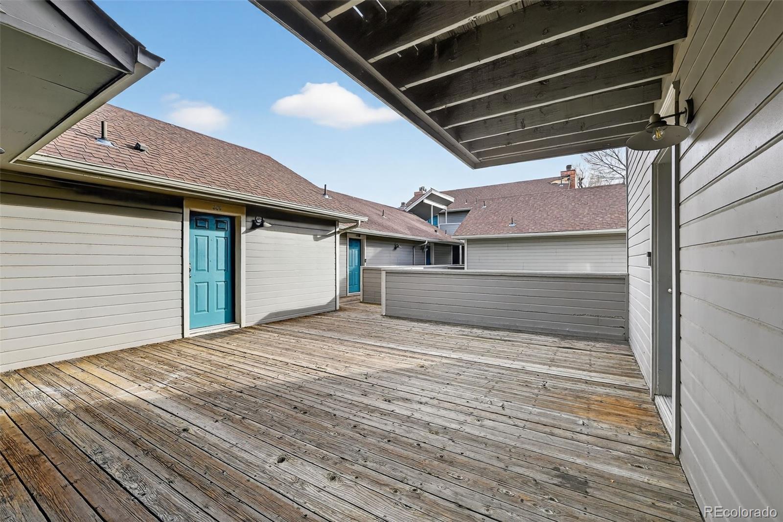 1405 Broadway, Unit 307 Boulder, CO 80302 - Photo 8 of 20 a view of backyard with wooden floor