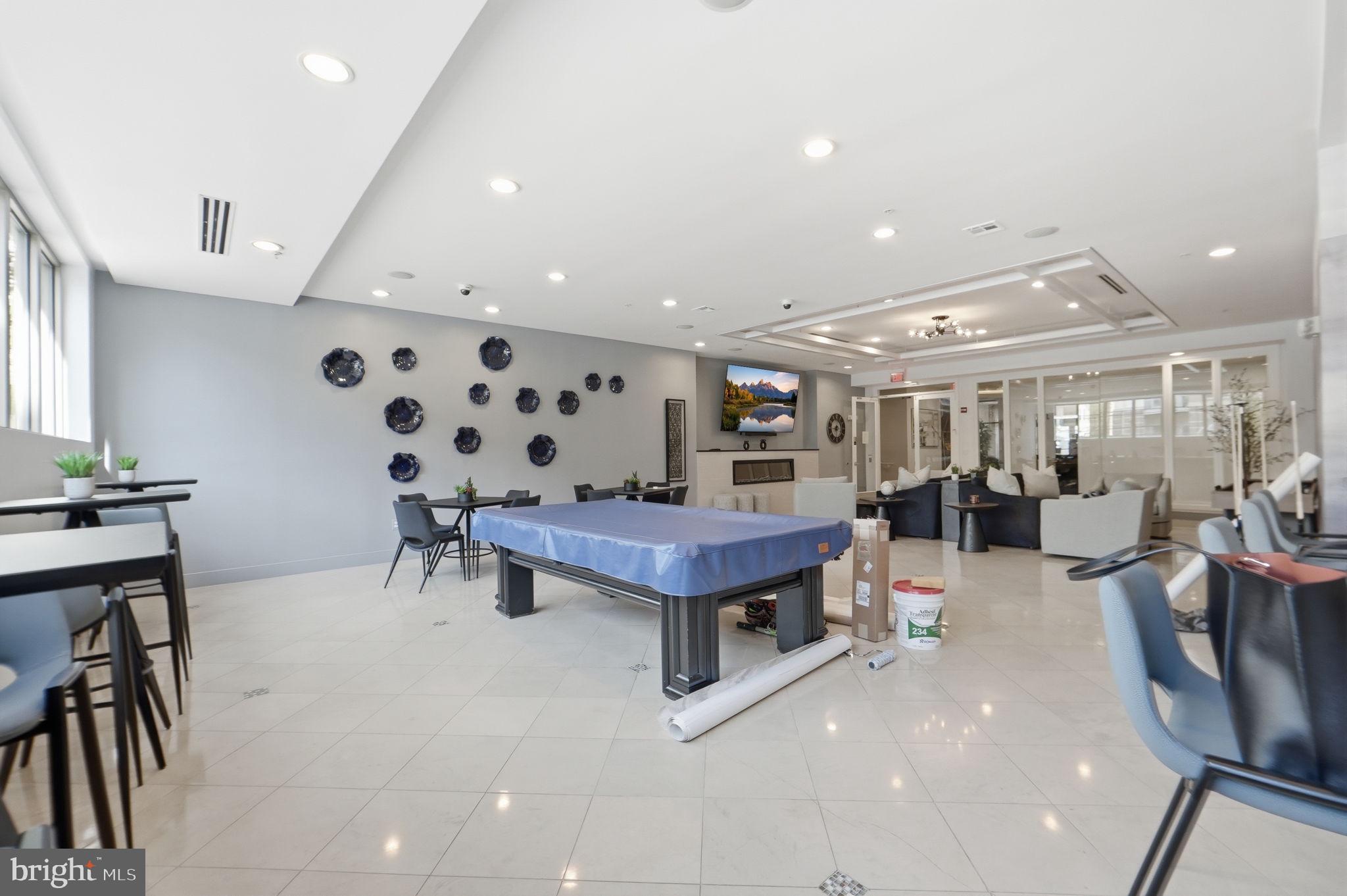 12001 Market Street, Unit 140 Reston, VA 20190 - Photo 33 of 48 Modern lounge with stylish decor.