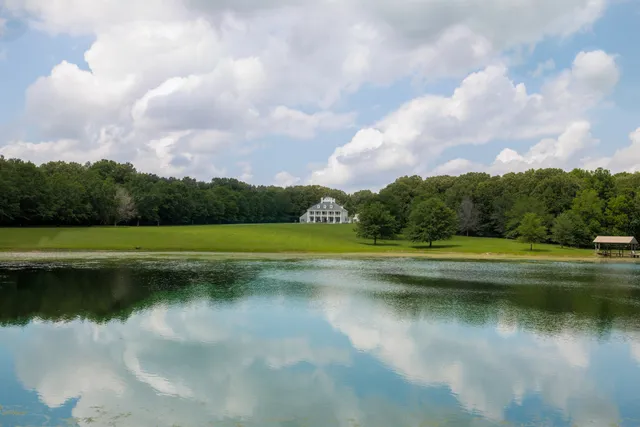 a view of lake with green space