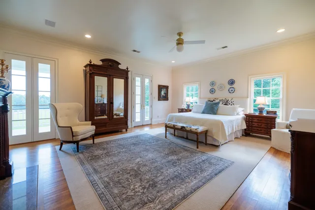 a view of grassy field with trees