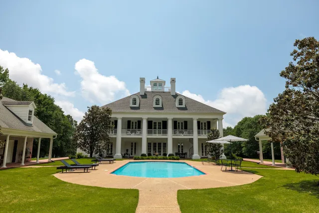 a view of a golf course with a garden